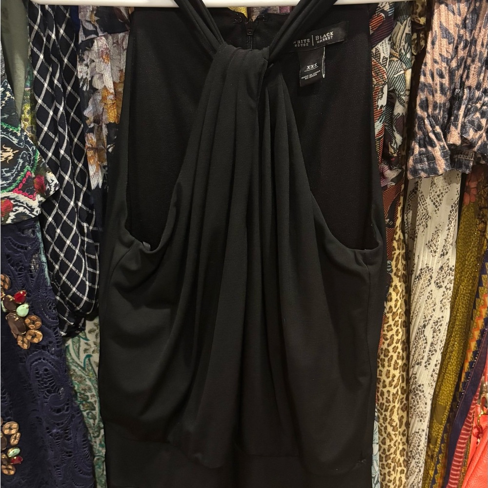Black Sleeveless JumpSuit:very flattering. XXS but runs large. Compare to Small